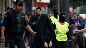 Woman in niqab paraded in Spanish style inquisition