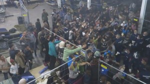 Hungarian police filmed throwing food at refugees
