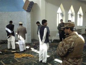 Blasts in Afghanistan mosque kill at least 62, wound more than 100
