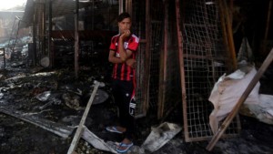 Suicide attack kills dozens at football stadium in Iraq